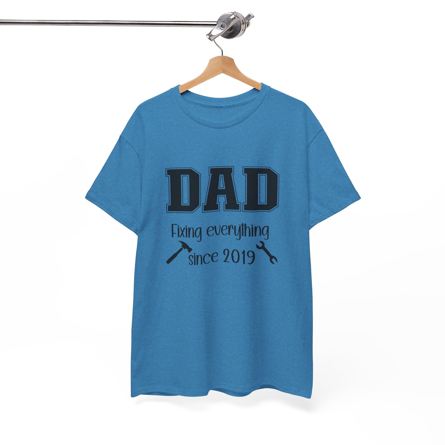 Customizable year, light blue t-shirt with 'DAD fixing everything since 2019' in black text with a small hammer and wrench graphic included.