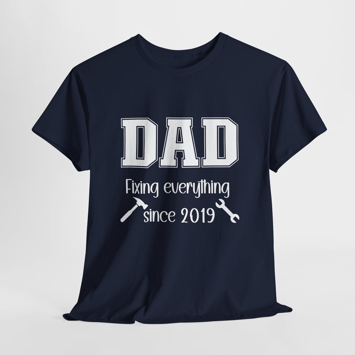 Customizable year, navy blue t-shirt with 'DAD fixing everything since 2019' in white text with a small hammer and wrench graphic included.