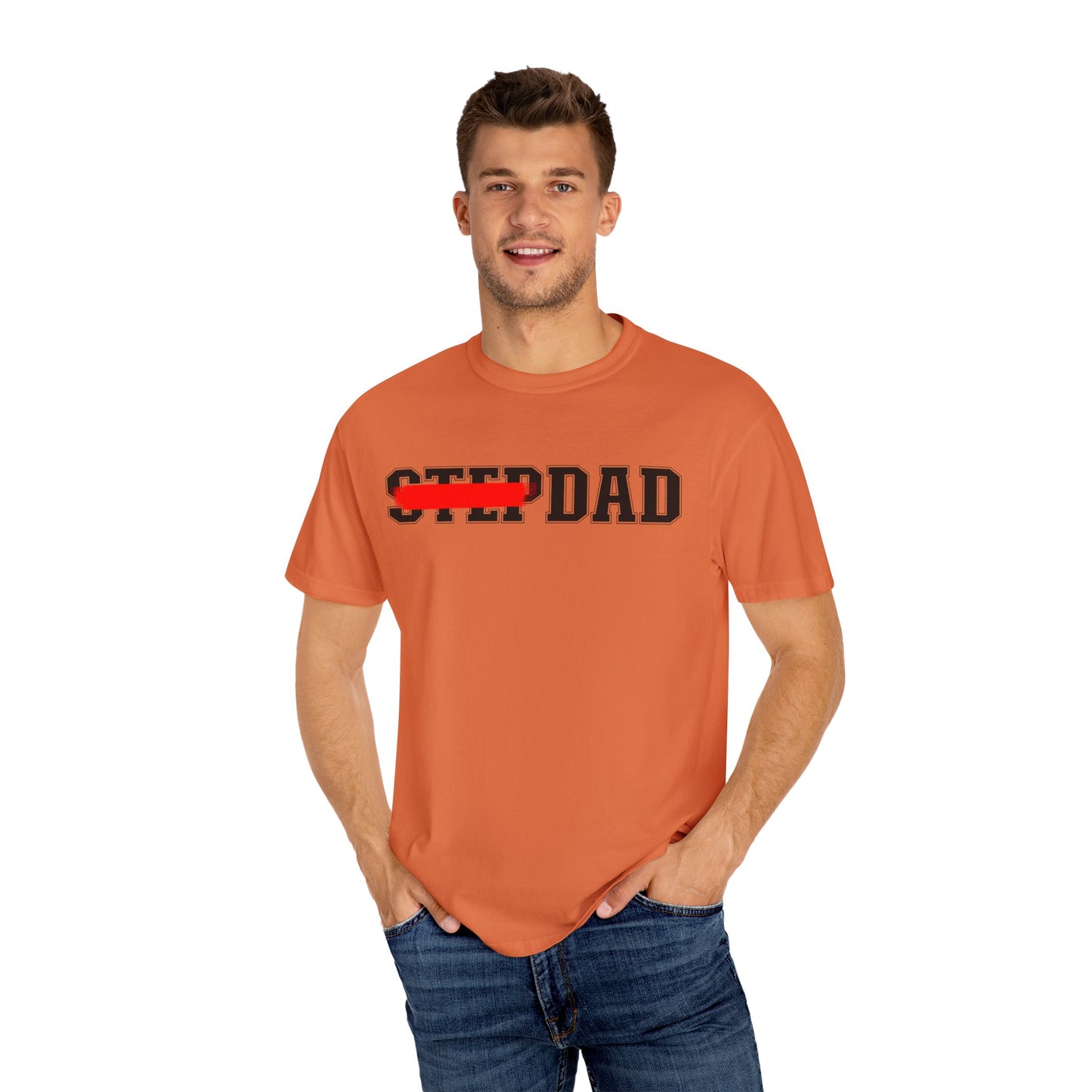 An orange t-shirt with black 'STEP DAD' text across the chest, the word 'STEP' is crossed out with a red line so only 'DAD' is easily readable.