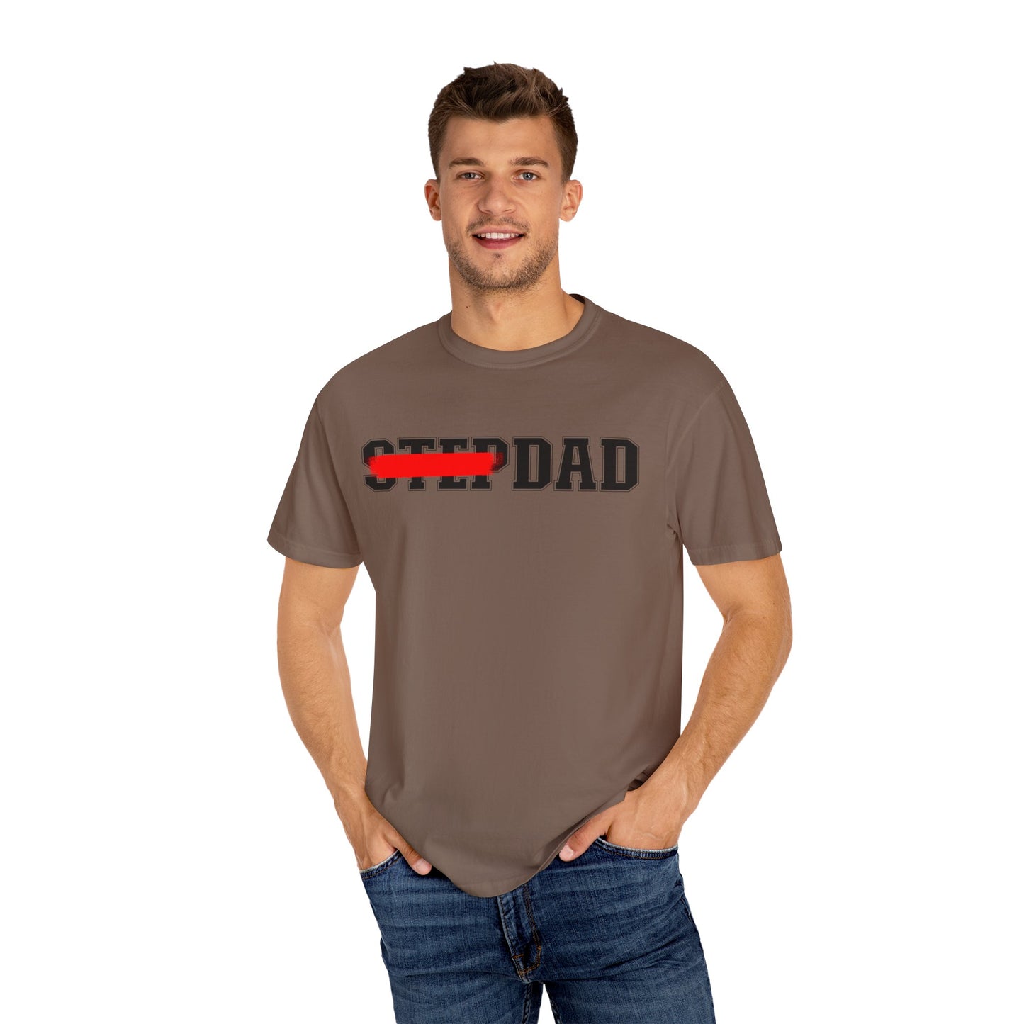 A brown t-shirt with black 'STEP DAD' text across the chest, the word 'STEP' is crossed out with a red line so only 'DAD' is easily readable.