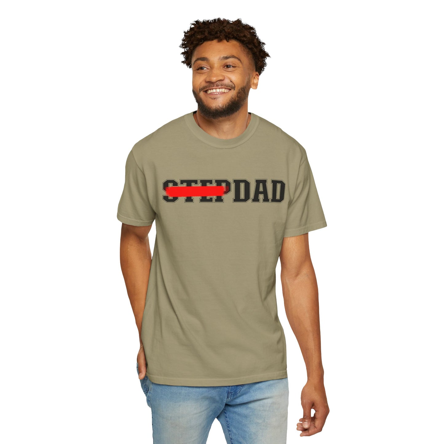 A green t-shirt with black 'STEP DAD' text across the chest, the word 'STEP' is crossed out with a red line so only 'DAD' is easily readable.