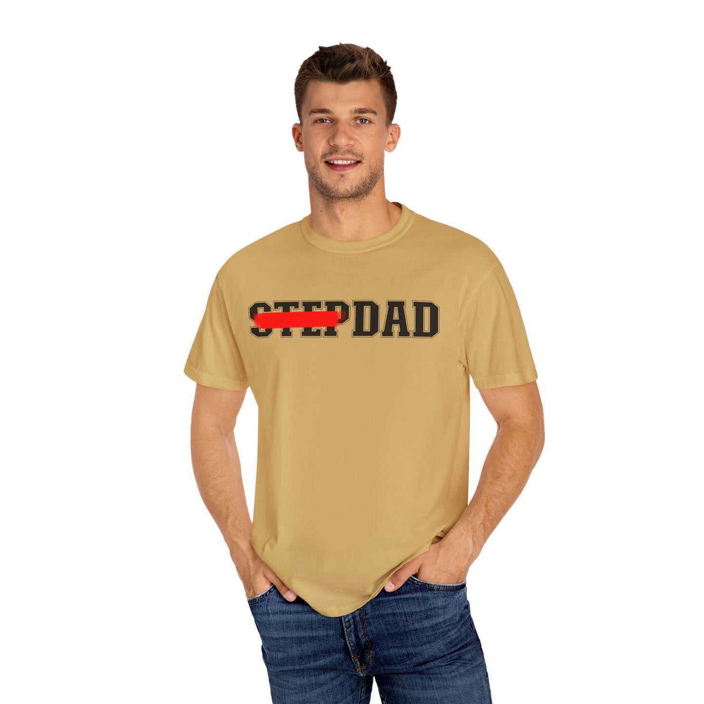 A beige t-shirt with black 'STEP DAD' text across the chest, the word 'STEP' is crossed out with a red line so only 'DAD' is easily readable.