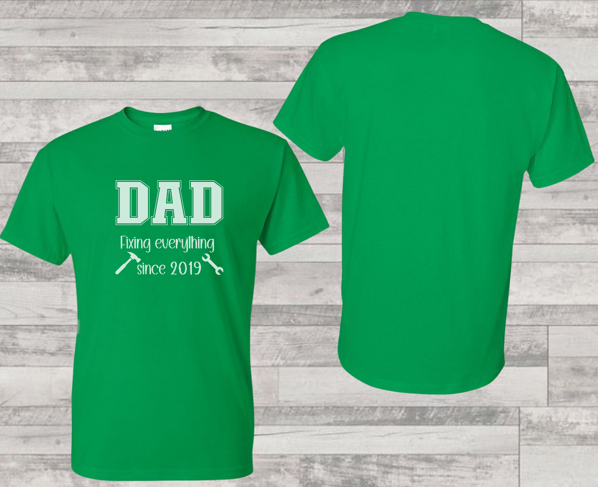 Customizable year, green t-shirt with 'DAD fixing everything since 2019' in white text with a small hammer and wrench graphic included.