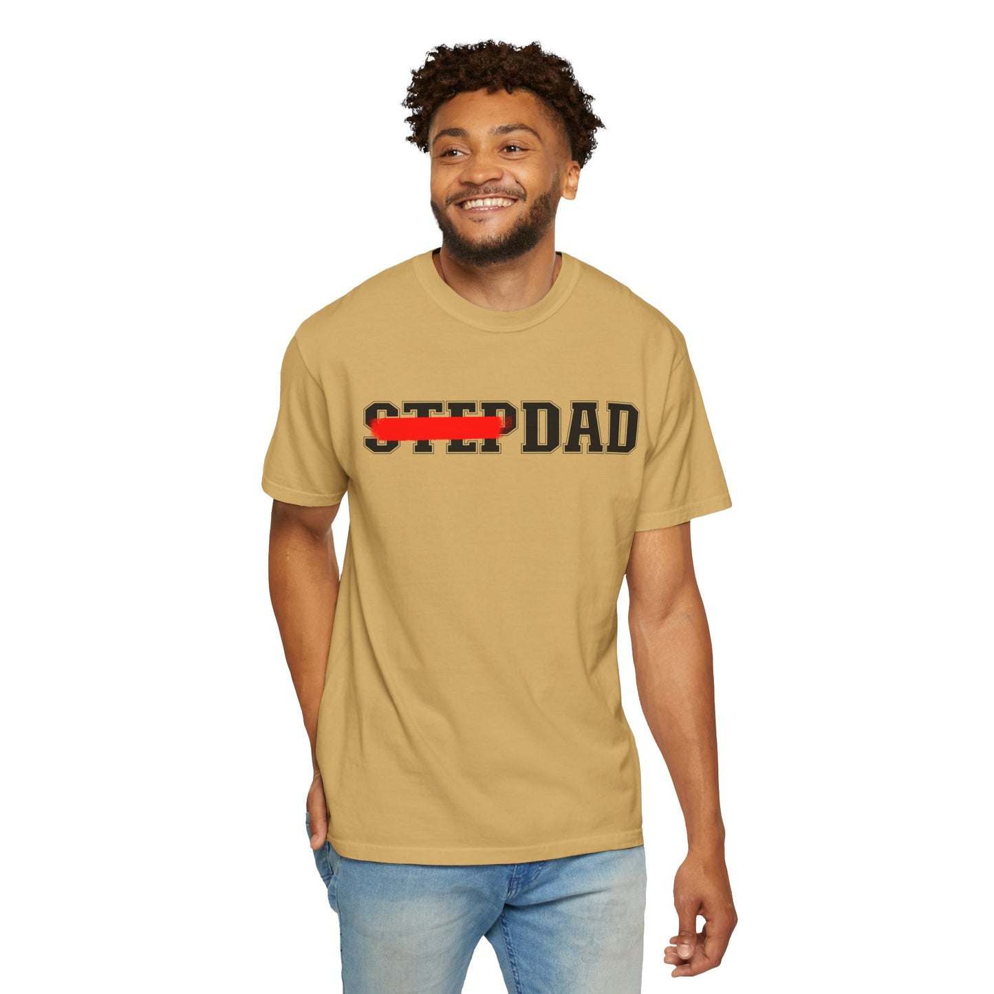 A beige t-shirt with black 'STEP DAD' text across the chest, the word 'STEP' is crossed out with a red line so only 'DAD' is easily readable.