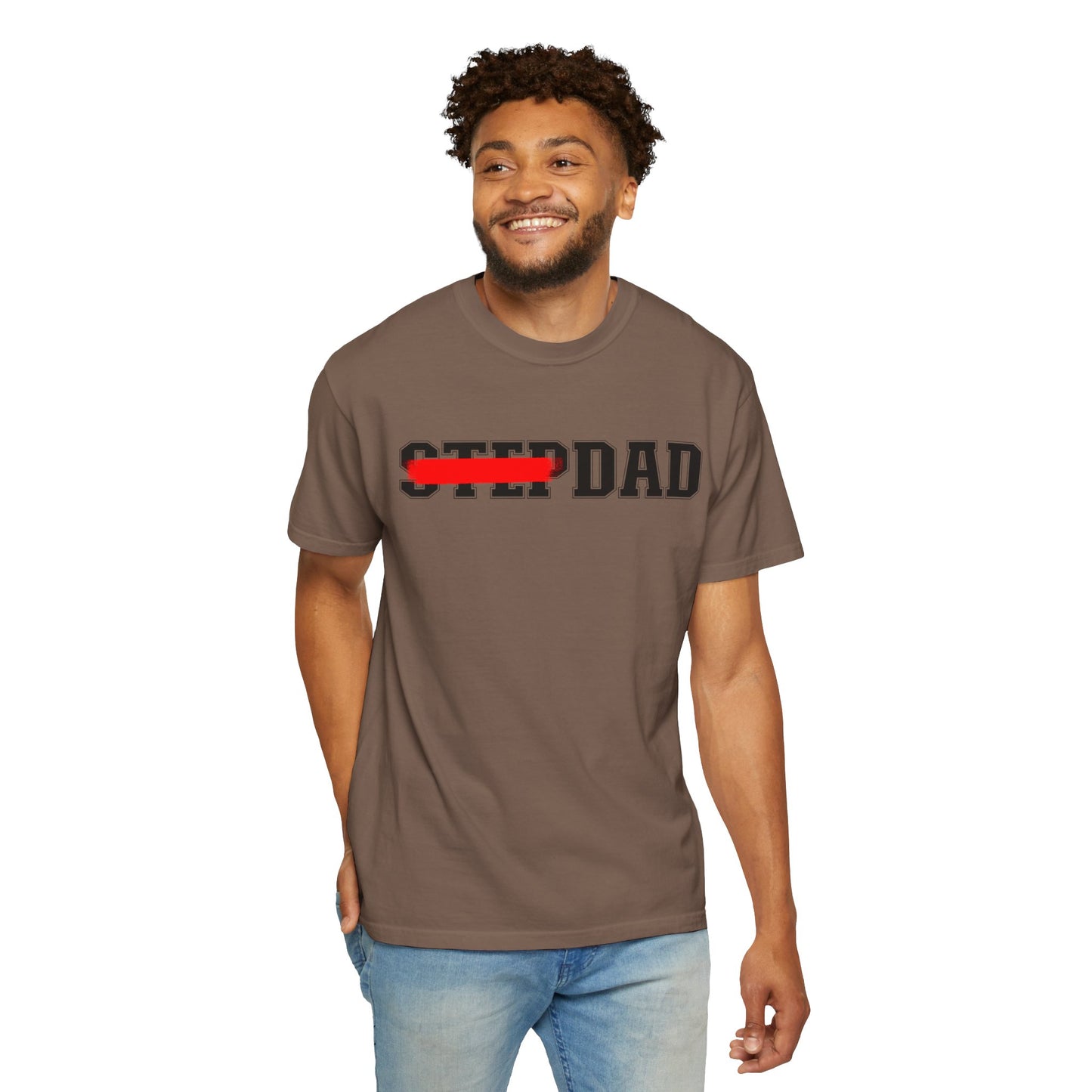 A brown t-shirt with black 'STEP DAD' text across the chest, the word 'STEP' is crossed out with a red line so only 'DAD' is easily readable.