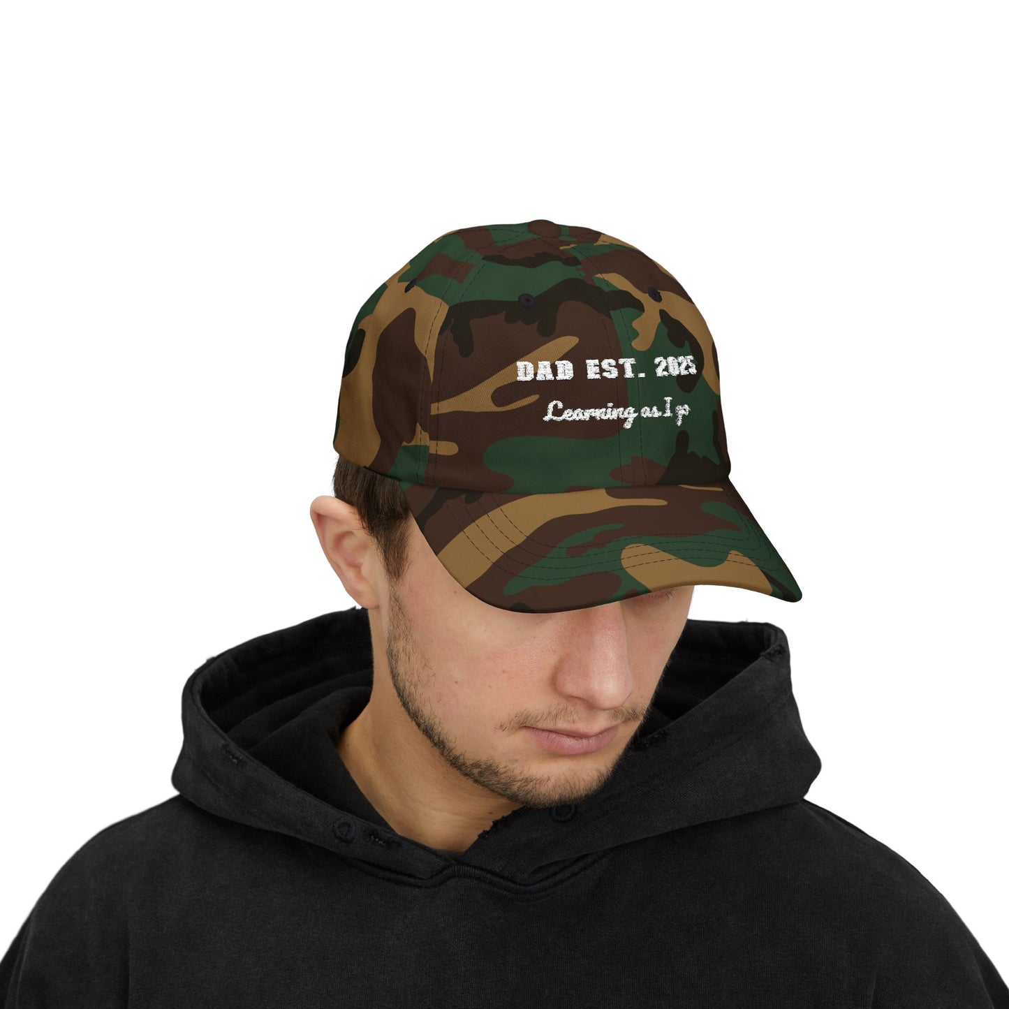 Customizable year, Camouflage cap with text 'DAD EST. 2025 Learning as I go' in a white text