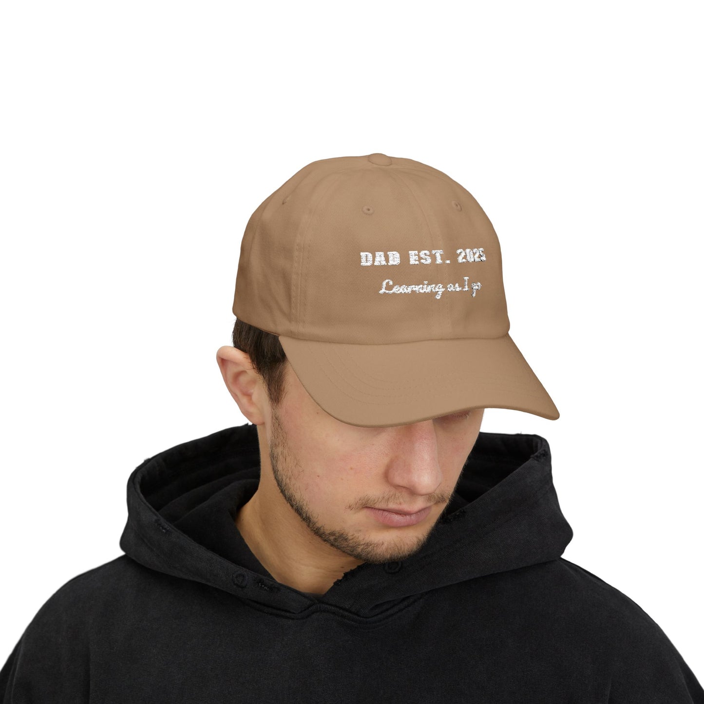 Customizable year, Brown cap with text 'DAD EST. 2025 Learning as I go' in a white text