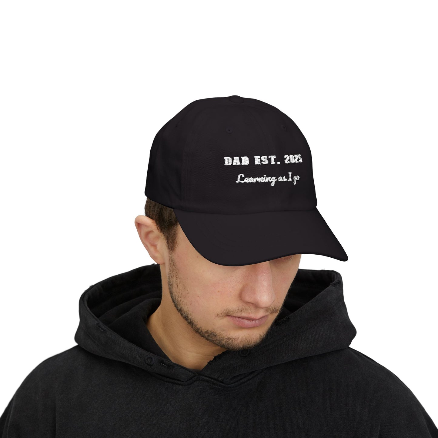 Customizable year, Black cap with text 'DAD EST. 2025 Learning as I go' in a white text