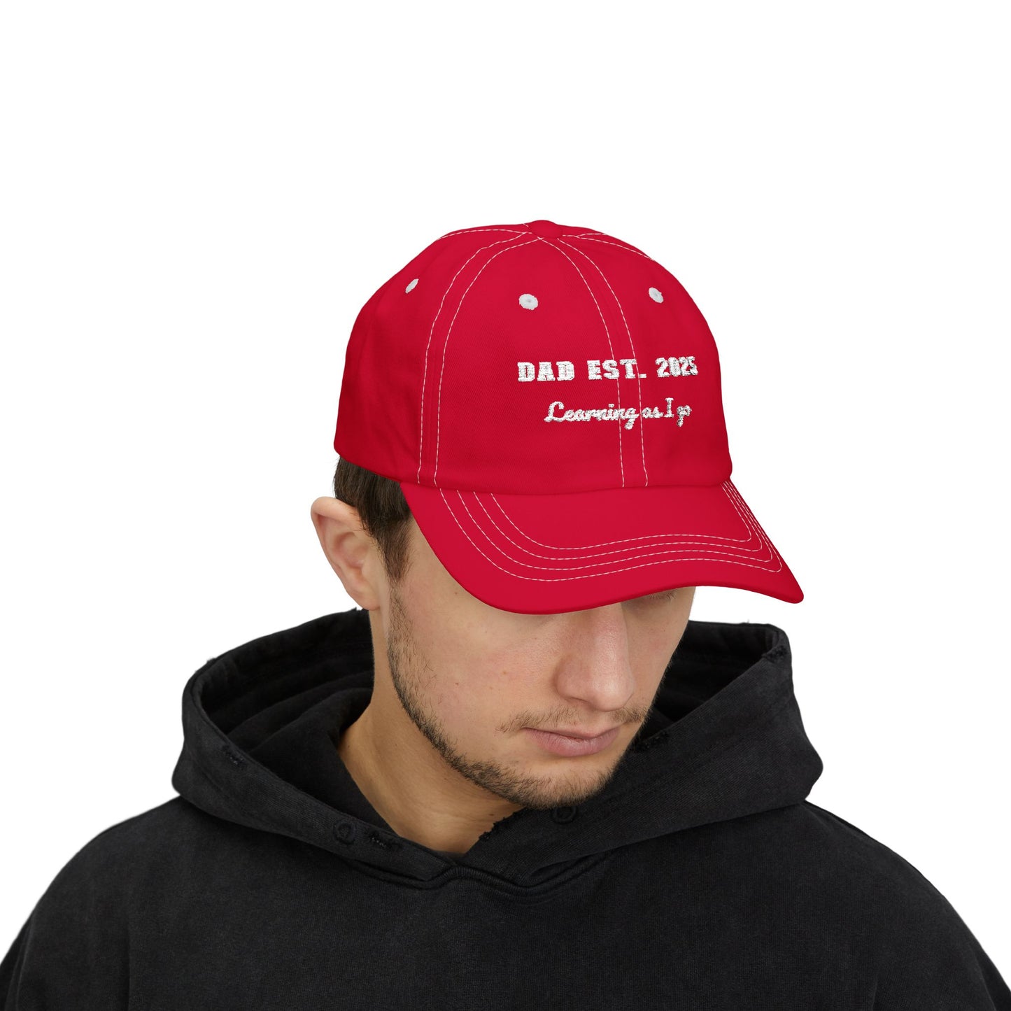 Customizable year, Red cap with text 'DAD EST. 2025 Learning as I go' in a white text