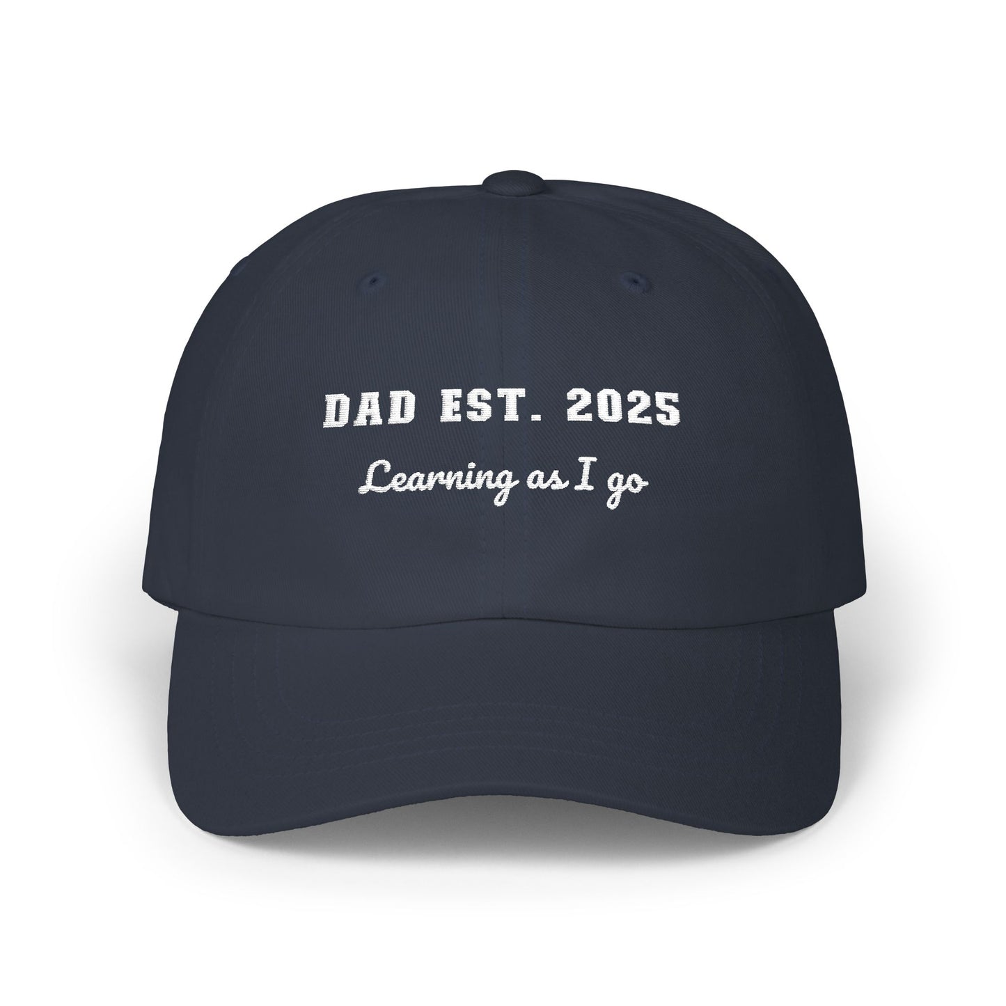 Customizable year, Navy blue cap with text 'DAD EST. 2025 Learning as I go' in a white text