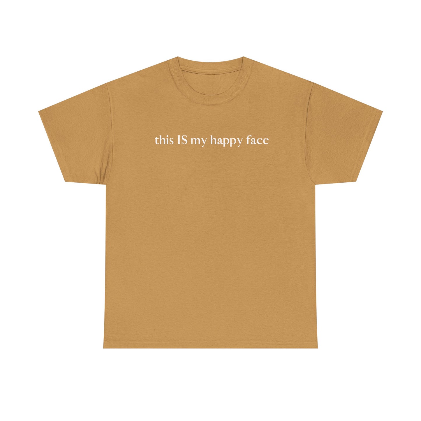 A beige unisex cotton t-shirt with the text 'this IS my happy face' printed in white across the chest. All characters are lower case except the word 'IS' which are in capital letters.