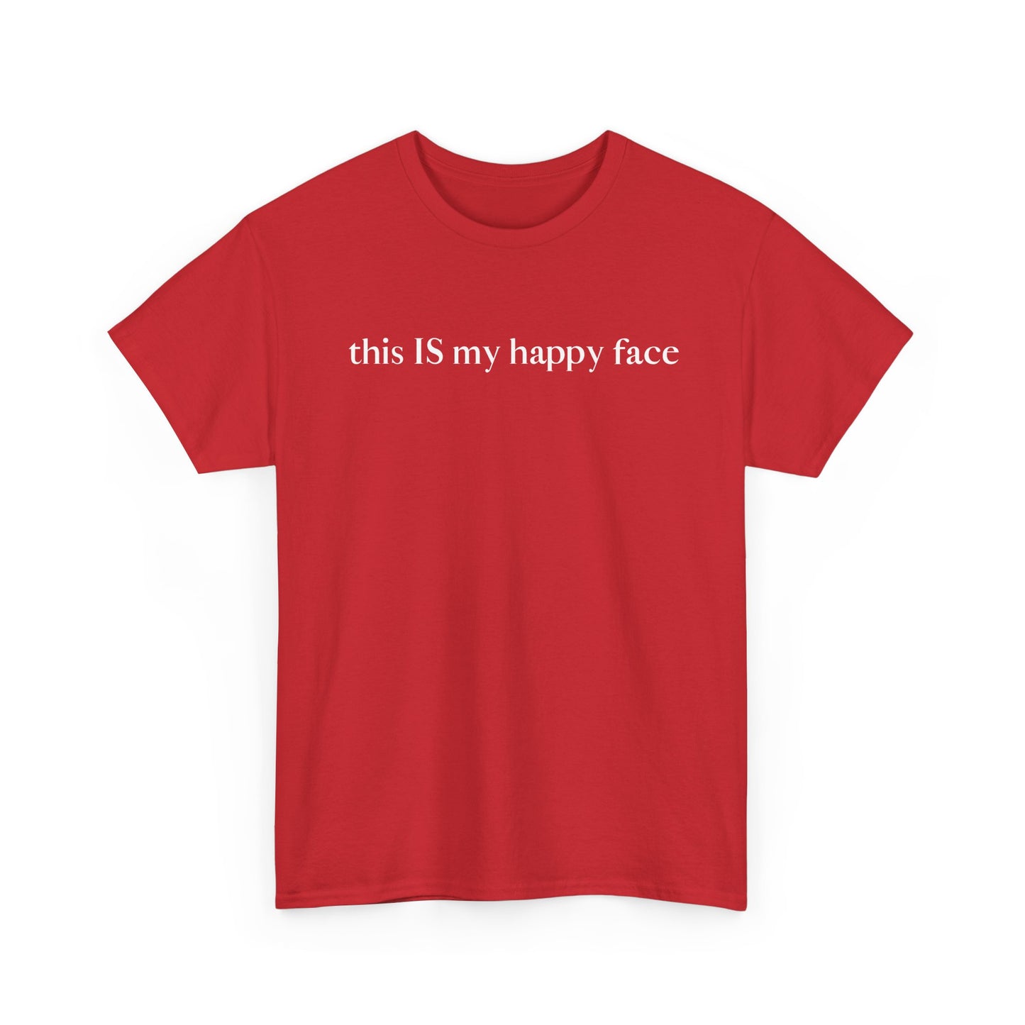 A red unisex cotton t-shirt with the text 'this IS my happy face' printed in white across the chest. All characters are lower case except the word 'IS' which are in capital letters.