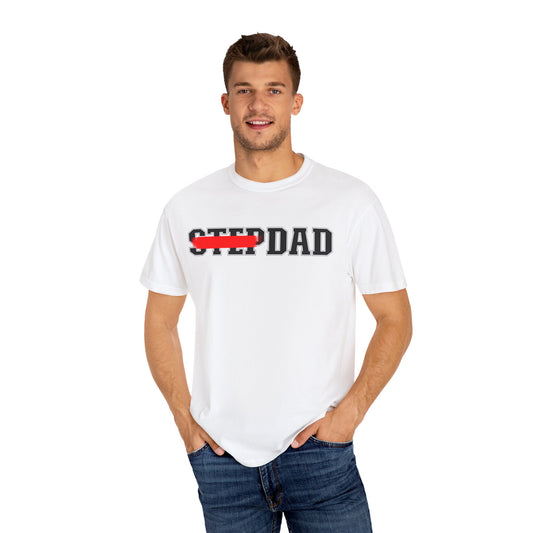 A white t-shirt with black 'STEP DAD' text across the chest, the word 'STEP' is crossed out with a red line so only 'DAD' is easily readable.