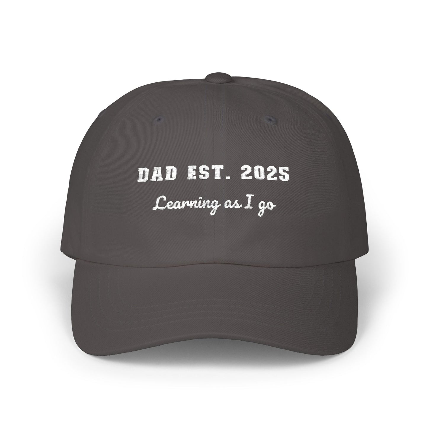 Customizable year, Dark Gray cap with text 'DAD EST. 2025 Learning as I go' in a white text