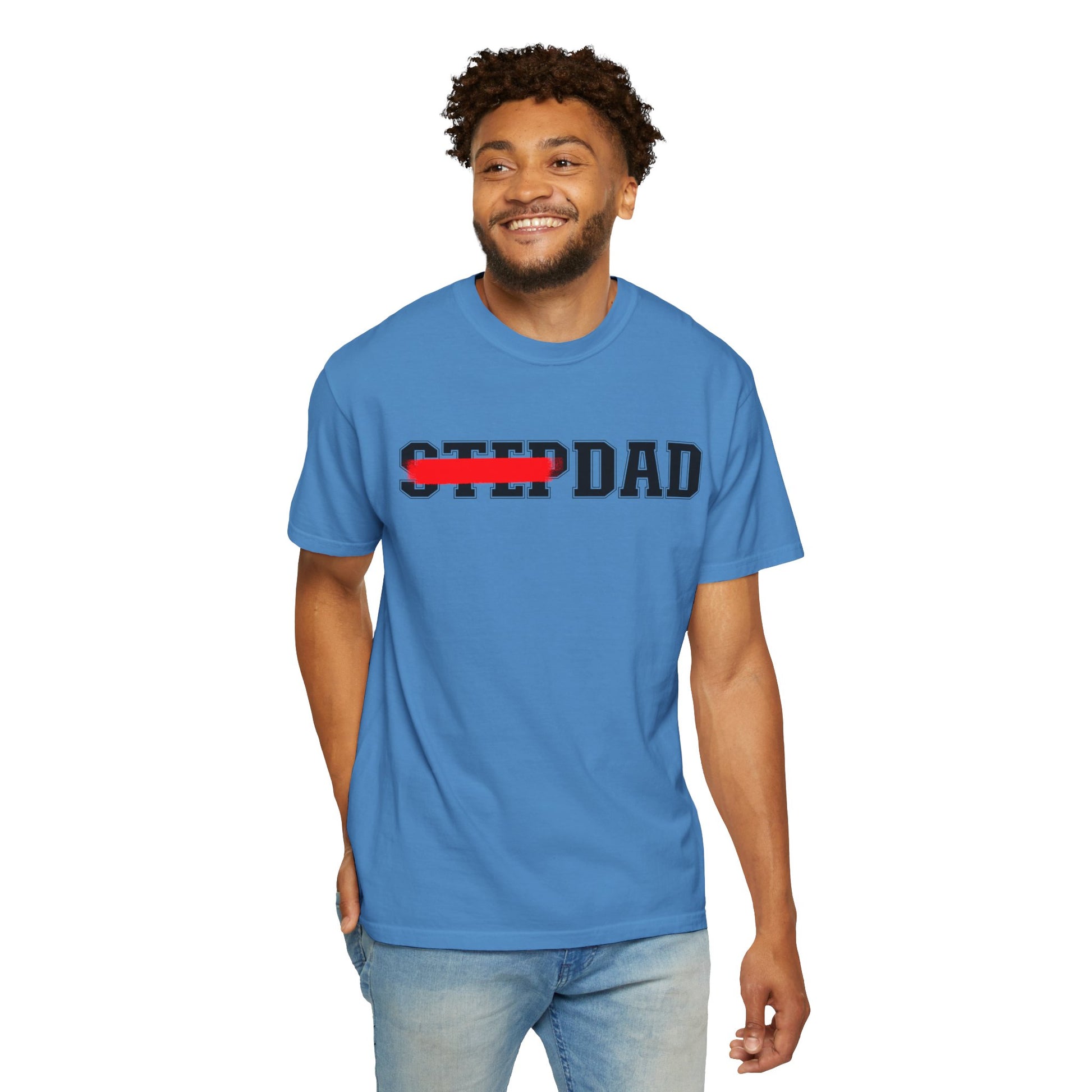 A blue t-shirt with black 'STEP DAD' text across the chest, the word 'STEP' is crossed out with a red line so only 'DAD' is easily readable.