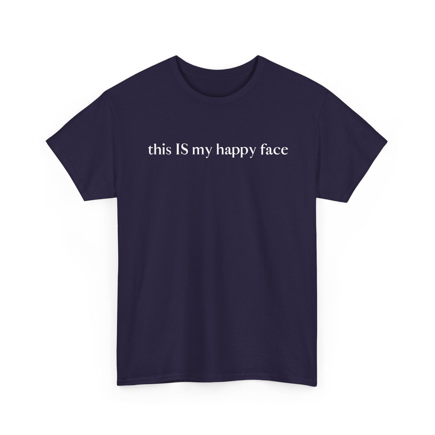 A purple unisex cotton t-shirt with the text 'this IS my happy face' printed in white across the chest. All characters are lower case except the word 'IS' which are in capital letters.