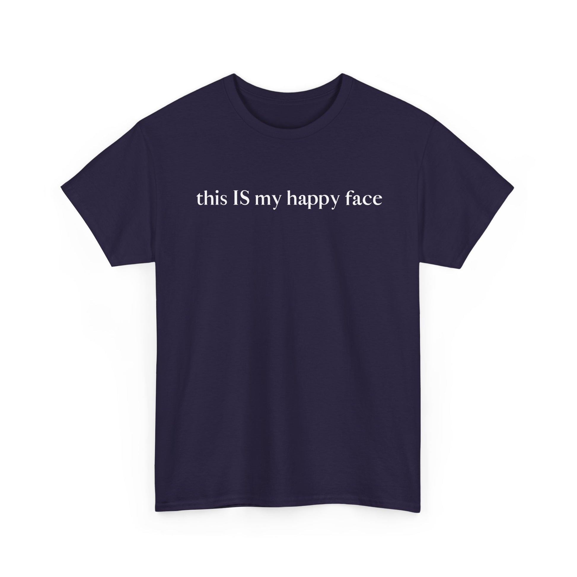 A purple unisex cotton t-shirt with the text 'this IS my happy face' printed in white across the chest. All characters are lower case except the word 'IS' which are in capital letters.